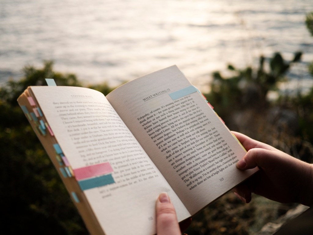 photograph of a book taken by the sea